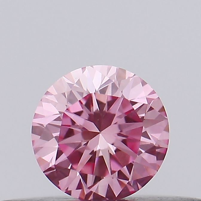 Actual 0.18 carat Vivid Pink Round lab-grown diamond
