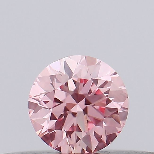 Actual 0.17 carat Vivid Pink Round lab-grown diamond