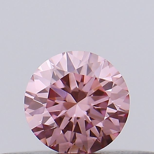 Actual 0.17 carat Vivid Pink Round lab-grown diamond