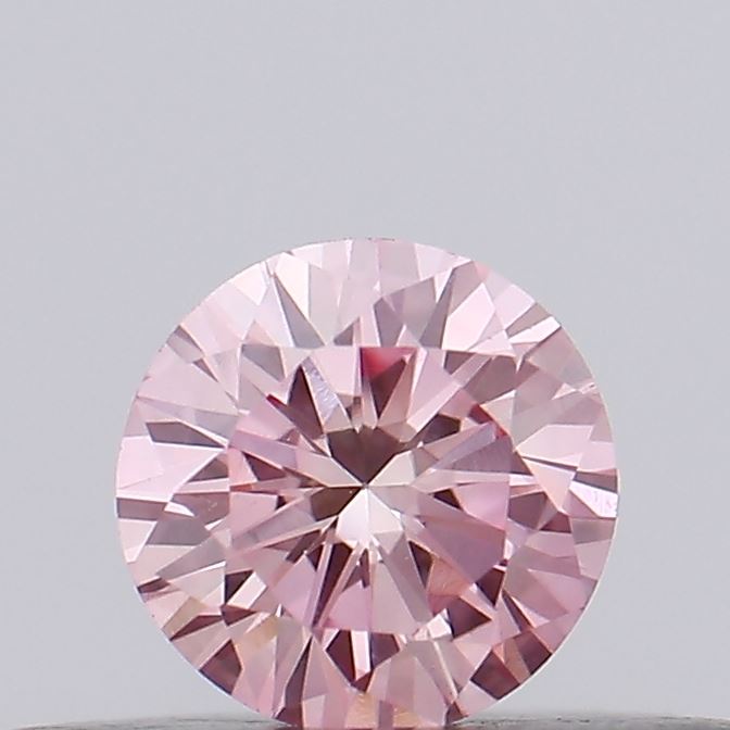 Actual 0.17 carat Vivid Pink Round lab-grown diamond