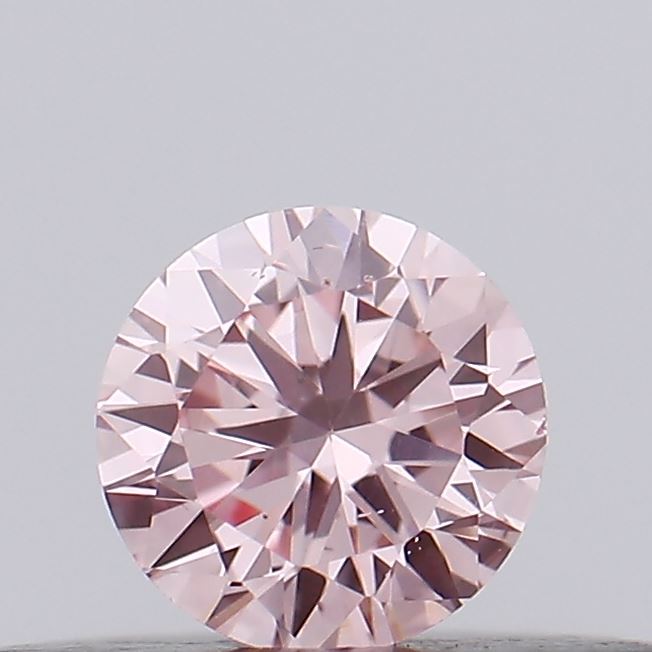Actual 0.16 carat Intense Pink Round lab-grown diamond