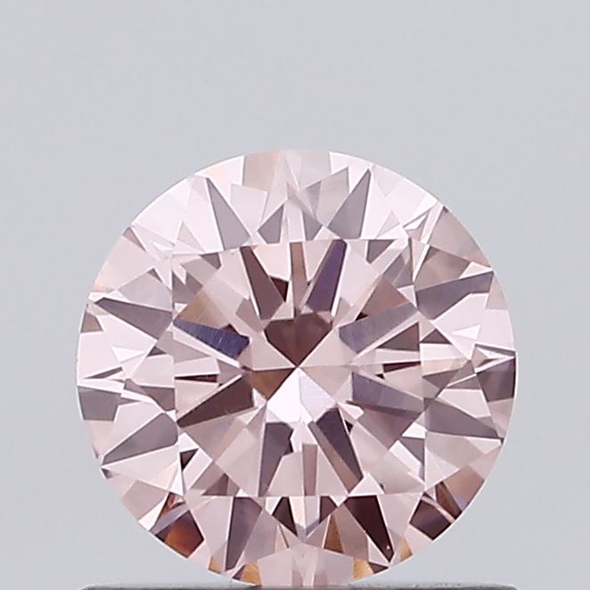 Actual 0.74 carat Intense Pink Round lab-grown diamond