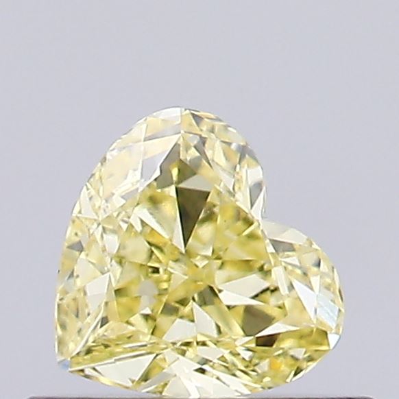 Actual 0.36 carat Fancy Intense Yellow Heart lab-grown diamond