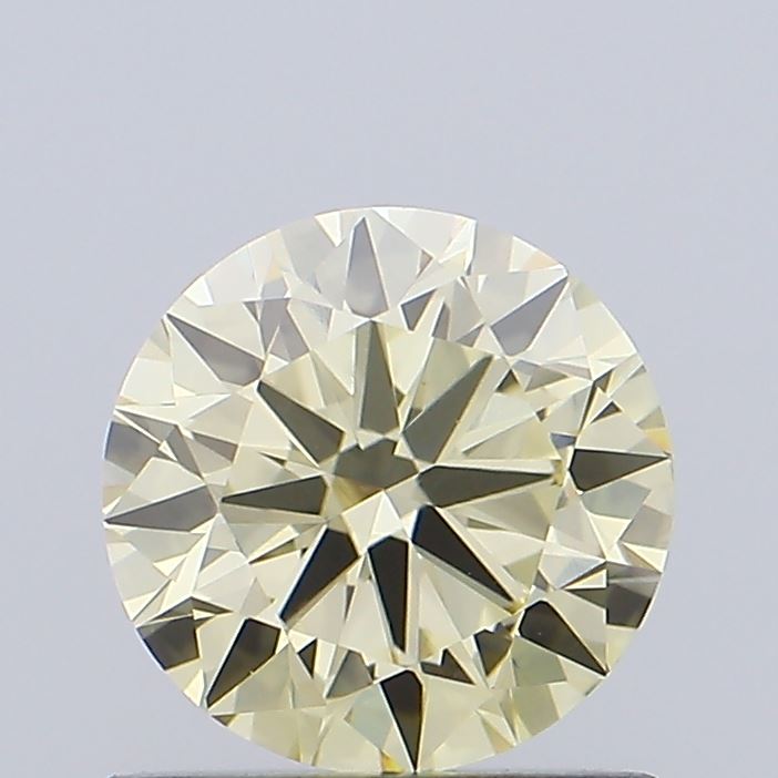 Actual 0.9 carat Light Yellow Round lab-grown diamond