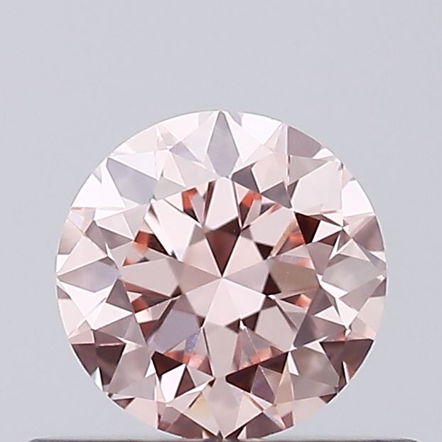 Actual 0.39 carat Intense Pink Round lab-grown diamond