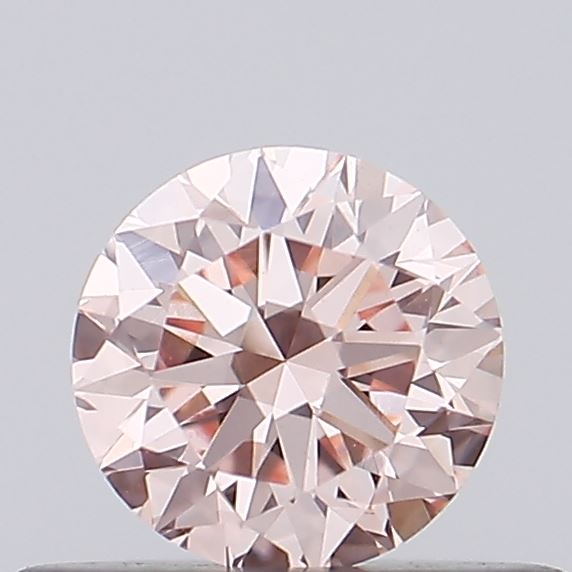 Actual 0.39 carat Fancy Intense Pink Round lab-grown diamond
