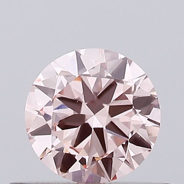 Actual 0.4 carat Fancy Intense Pink Round lab-grown diamond
