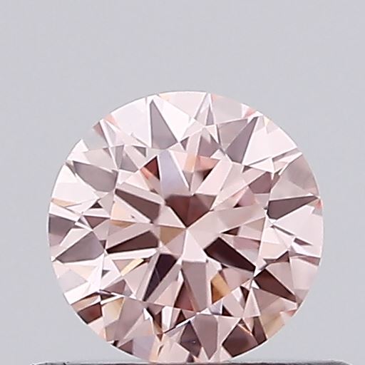 Actual 0.39 carat Fancy Intense Pink Round lab-grown diamond