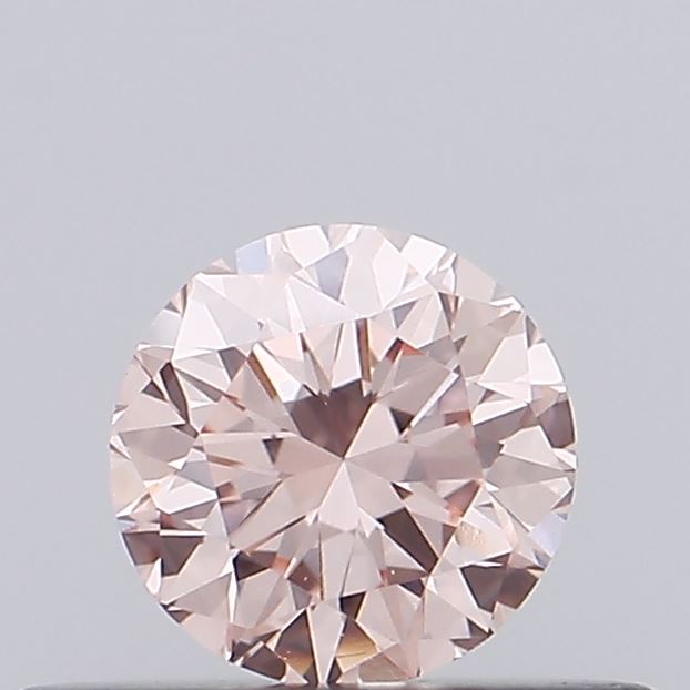 Actual 0.34 carat Fancy Intense Pink Round lab-grown diamond