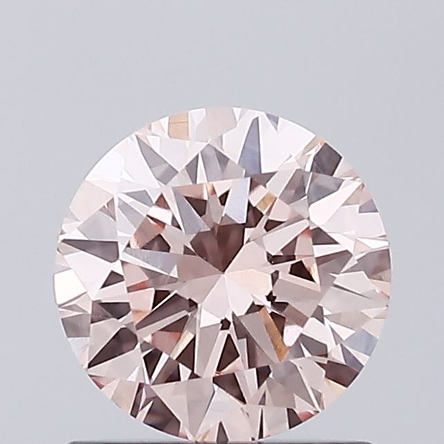 Actual 0.81 carat Intense Pink Round lab-grown diamond