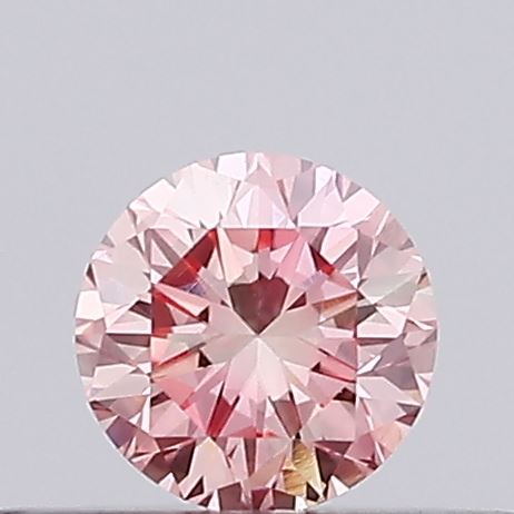 Actual 0.2 carat Vivid Pink Round lab-grown diamond