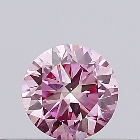 Actual 0.17 carat Vivid Pink Round lab-grown diamond