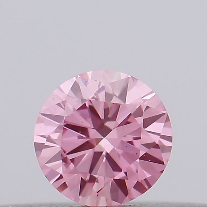Actual 0.14 carat Vivid Pink Round lab-grown diamond
