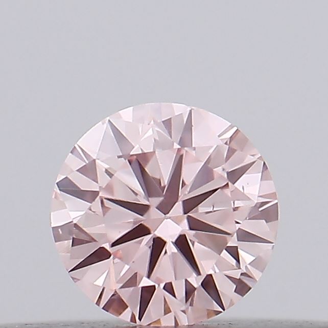 Actual 0.14 carat Intense Pink Round lab-grown diamond
