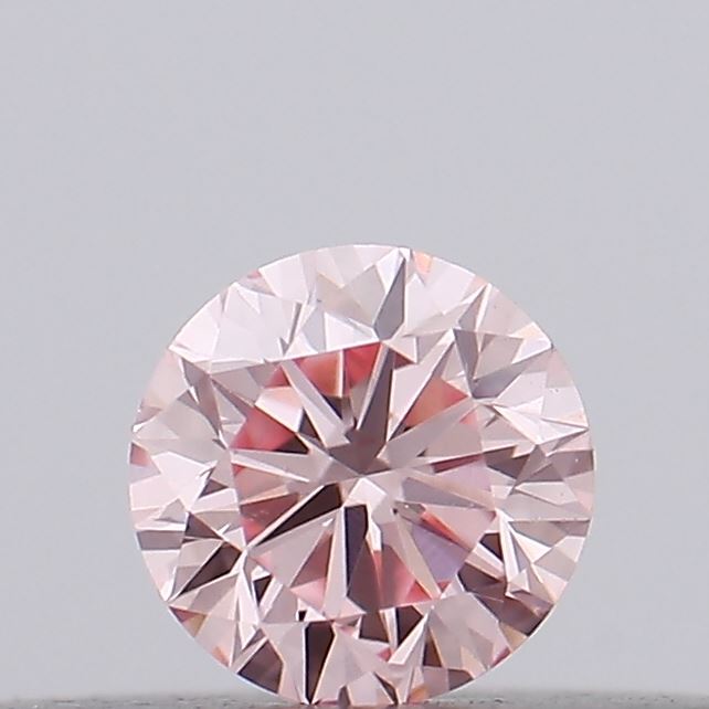 Actual 0.13 carat Intense Pink Round lab-grown diamond