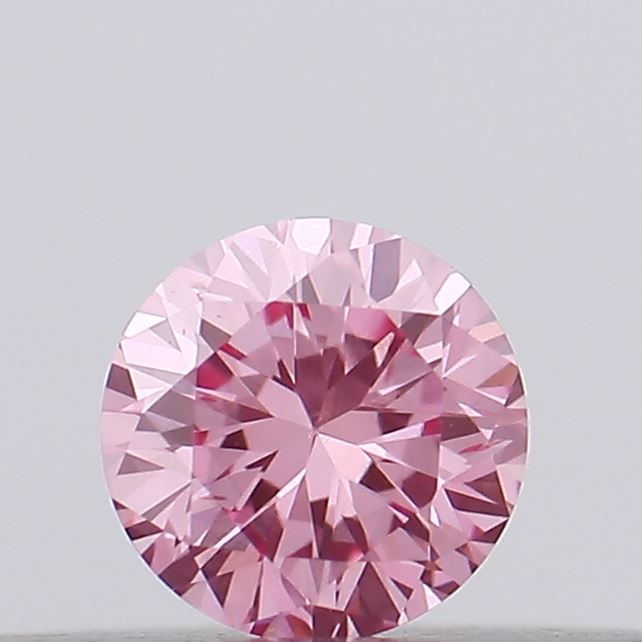 Actual 0.13 carat Vivid Pink Round lab-grown diamond