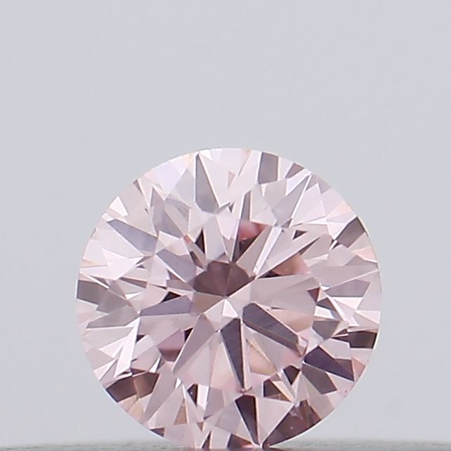 Actual 0.13 carat Intense Pink Round lab-grown diamond