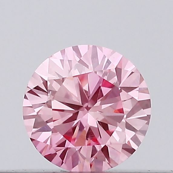 Actual 0.12 carat Vivid Pink Round lab-grown diamond