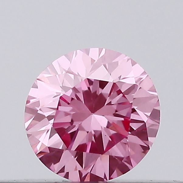Actual 0.14 carat Vivid Pink Round lab-grown diamond