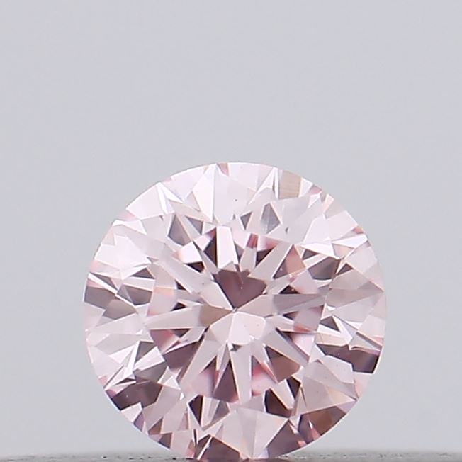 Actual 0.12 carat Intense Pink Round lab-grown diamond