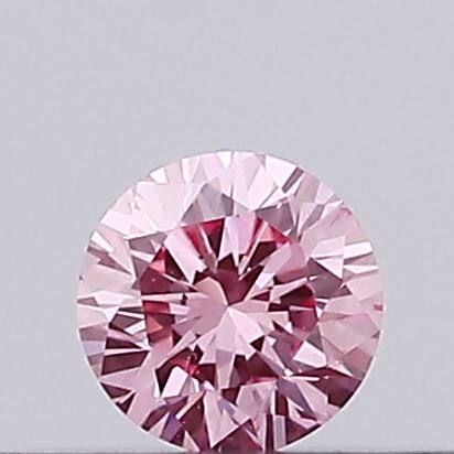 Actual 0.12 carat Vivid Pink Round lab-grown diamond