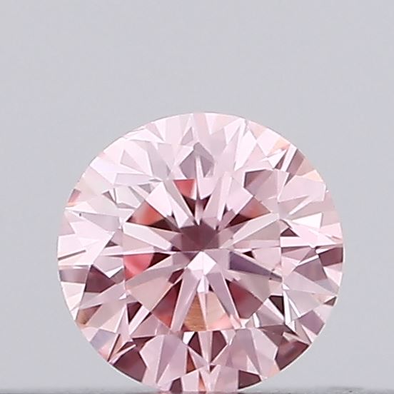 Actual 0.14 carat Vivid Pink Round lab-grown diamond