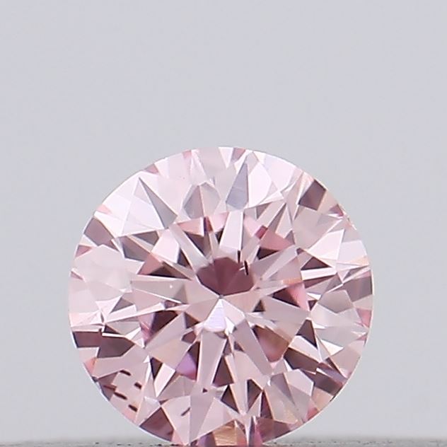 Actual 0.12 carat Vivid Pink Round lab-grown diamond