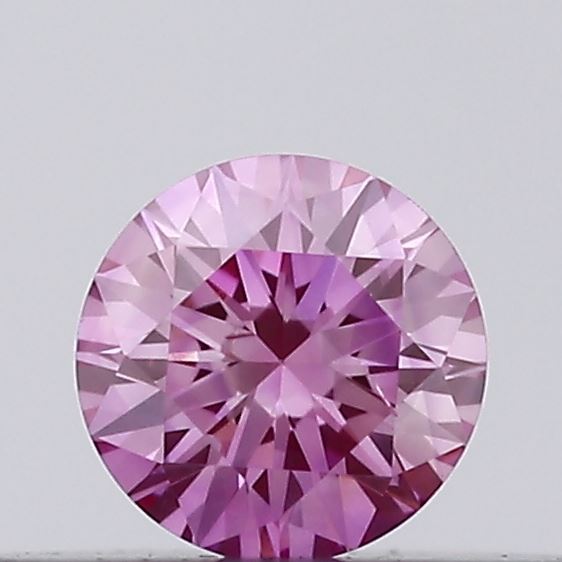 Actual 0.11 carat Vivid Pink Round lab-grown diamond