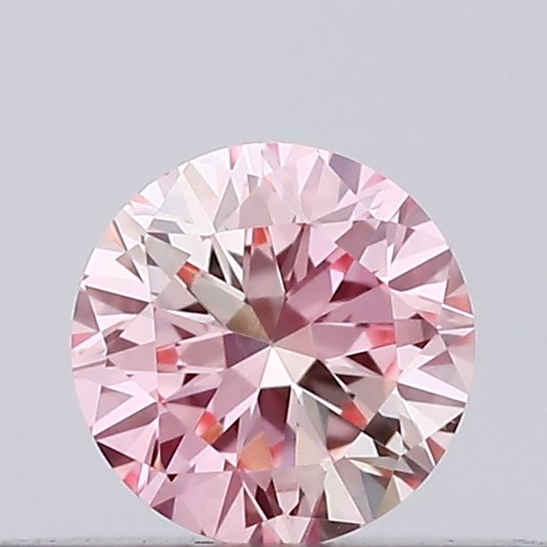 Actual 0.14 carat Intense Pink Round lab-grown diamond