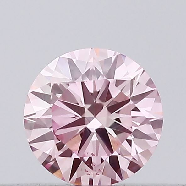 Actual 0.14 carat Intense Pink Round lab-grown diamond
