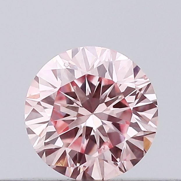 Actual 0.16 carat Intense Pink Round lab-grown diamond