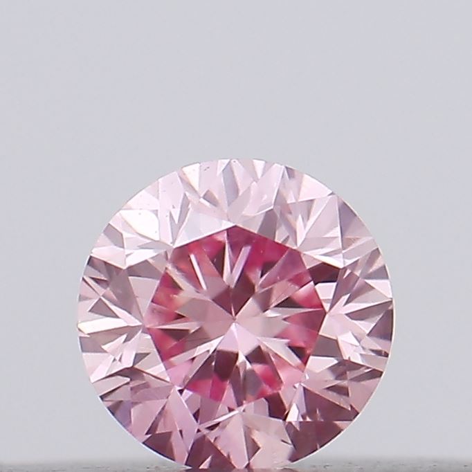 Actual 0.1 carat Vivid Pink Round lab-grown diamond
