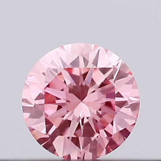 Actual 0.14 carat Vivid Pink Round lab-grown diamond