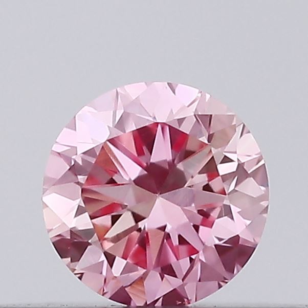 Actual 0.14 carat Vivid Pink Round lab-grown diamond