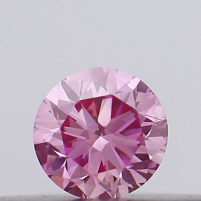 Actual 0.1 carat Vivid Pink Round lab-grown diamond