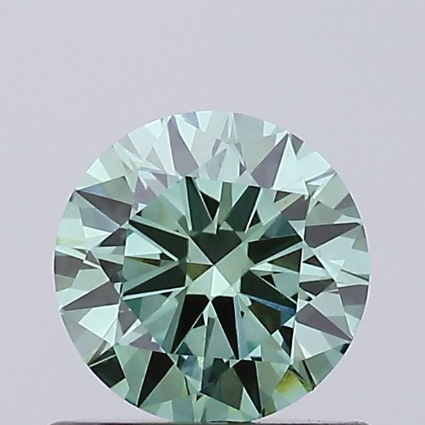 Actual 0.7 carat Vivid Green Round lab-grown diamond