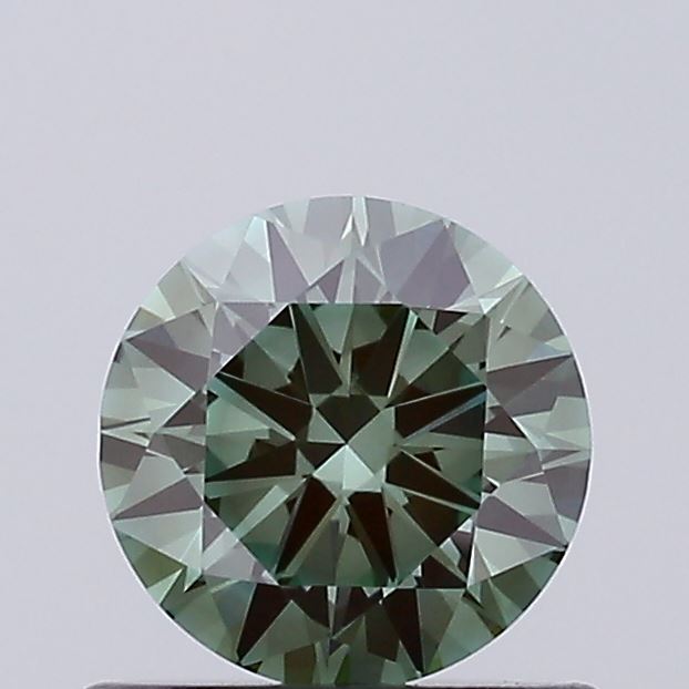 Actual 0.67 carat Vivid Green Round lab-grown diamond