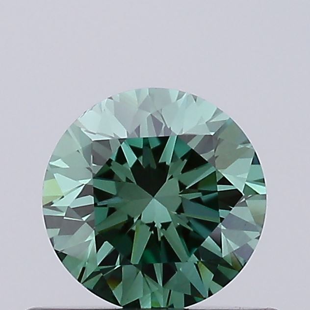 Actual 0.53 carat Vivid Green Round lab-grown diamond