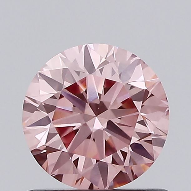 Actual 0.77 carat Vivid Pink Round lab-grown diamond