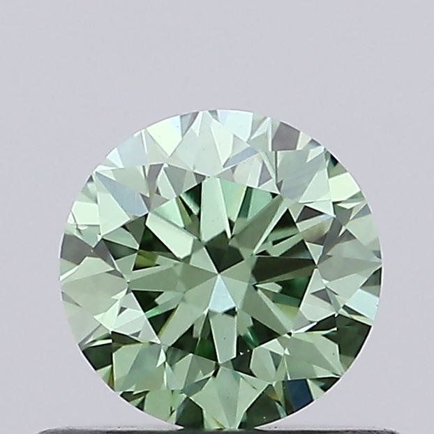 Actual 0.54 carat Vivid Green Round lab-grown diamond