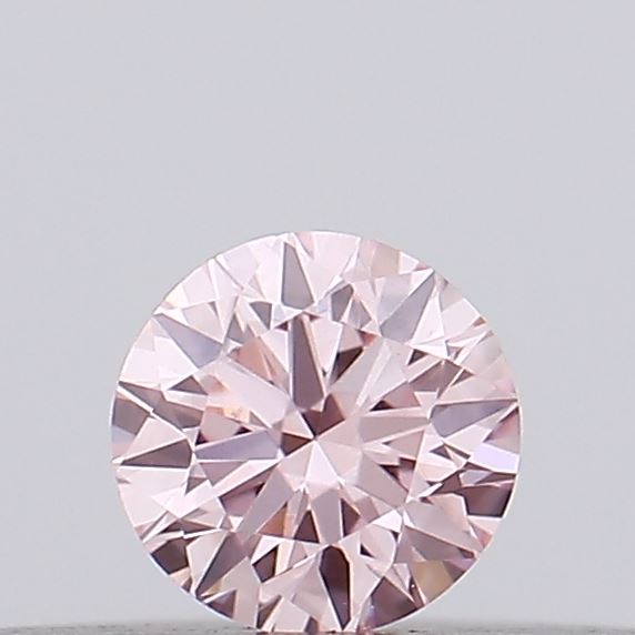 Actual 0.13 carat VS1 Round lab-grown diamond