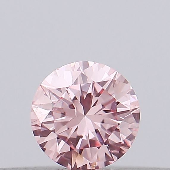 Actual 0.13 carat Intense Pink Round lab-grown diamond