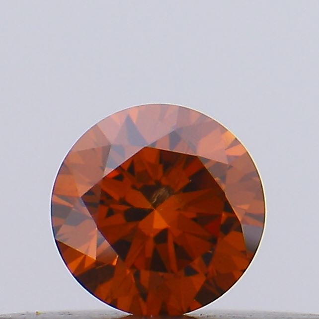 Actual 0.19 carat Deep Orange Round lab-grown diamond