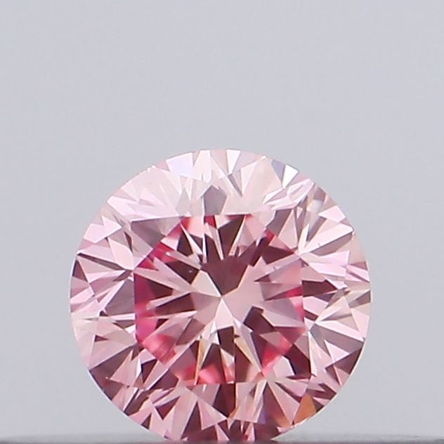 Actual 0.14 carat Vivid Pink Round lab-grown diamond