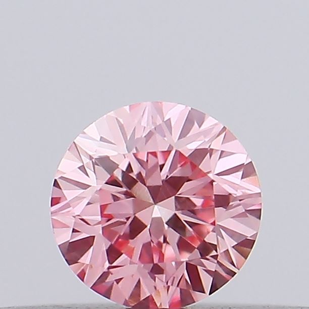 Actual 0.18 carat Vivid Pink Round lab-grown diamond