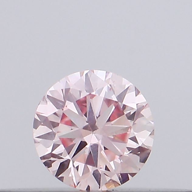 Actual 0.11 carat Intense Pink Round lab-grown diamond