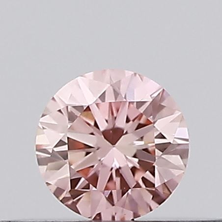 Actual 0.16 carat Vivid Pink Round lab-grown diamond