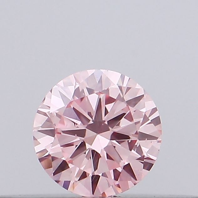 Actual 0.11 carat Intense Pink Round lab-grown diamond