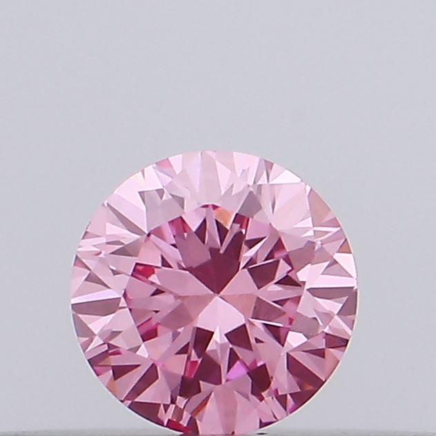 Actual 0.11 carat Vivid Pink Round lab-grown diamond