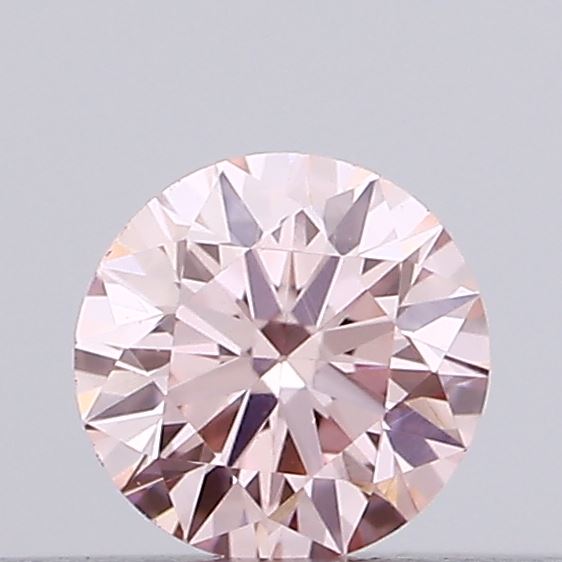 Actual 0.14 carat Intense Pink Round lab-grown diamond